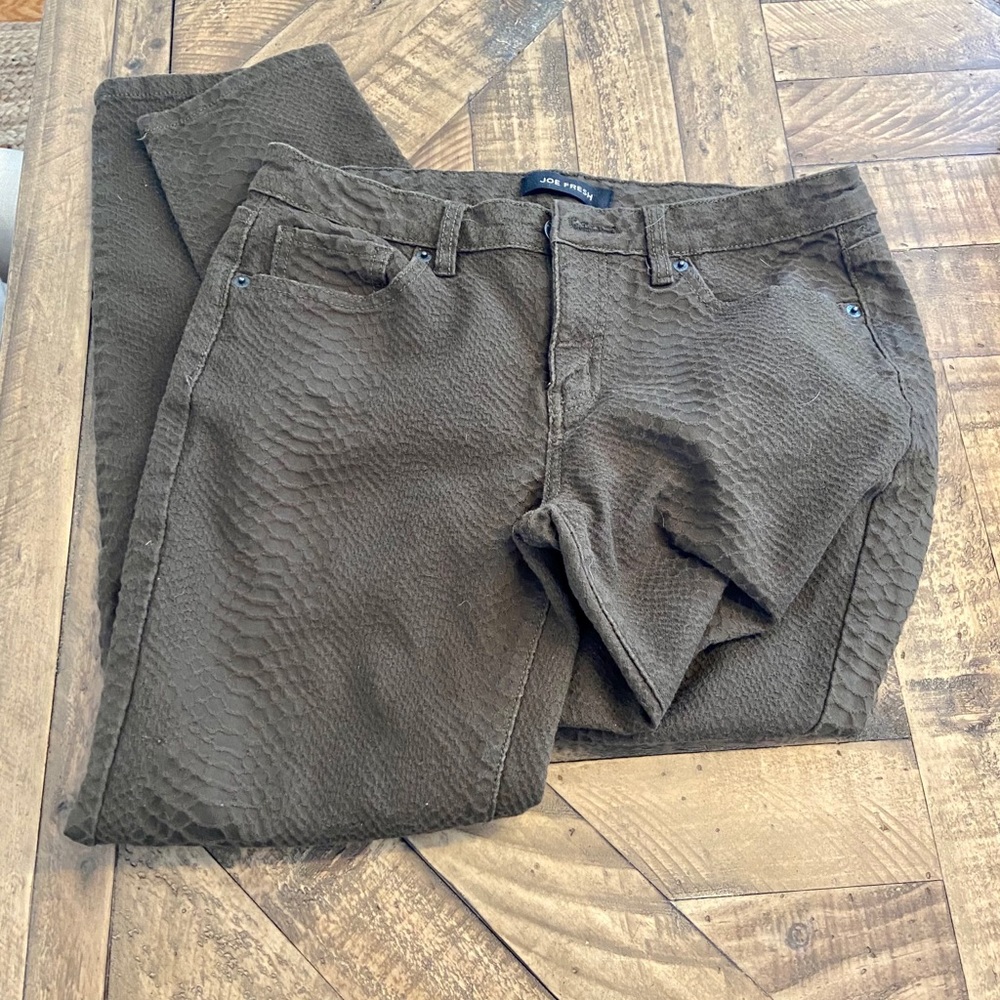 Green snakeskin skinny jeans